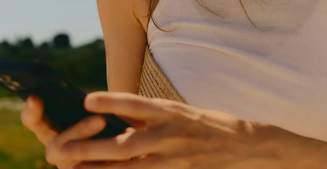 woman looking at her mobile