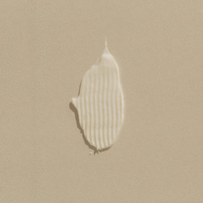 Balsamtest swipe på beige bakgrund