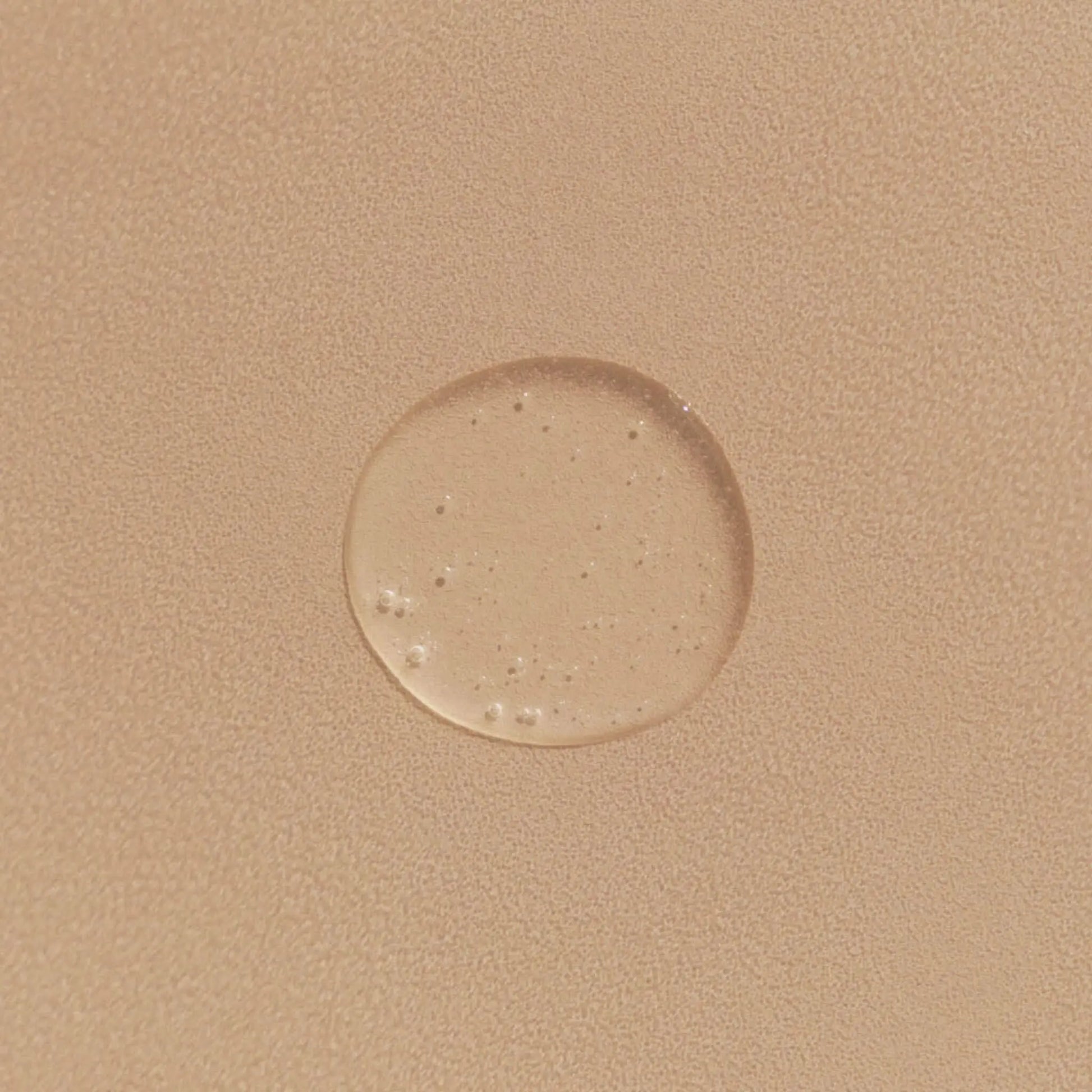 schampo textur bild på en ljus rosa bakgrund.