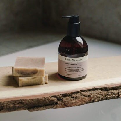 Bottle of Density Shampoo for hair strengthening and volume boost