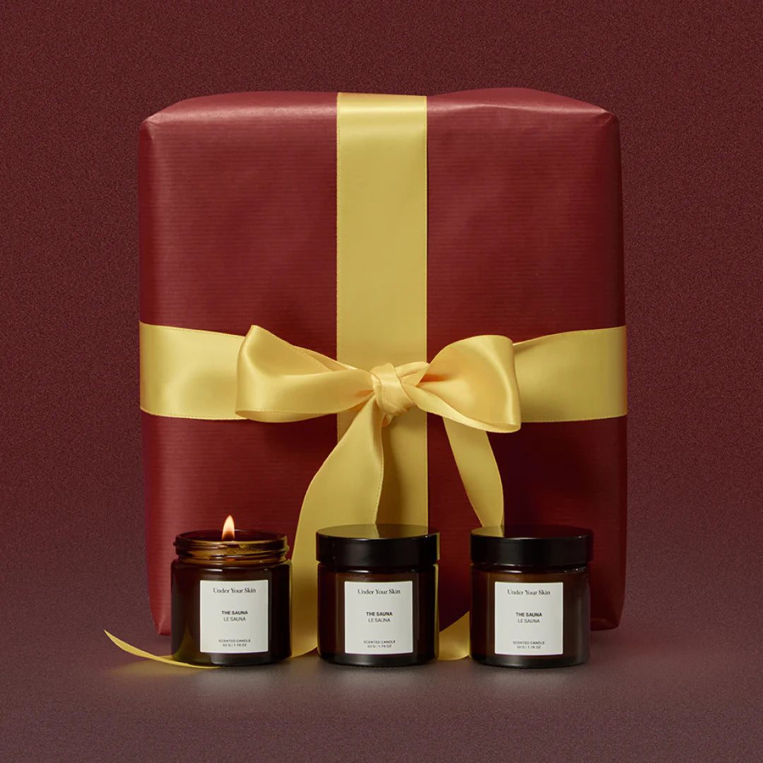 3 candles and a giftbox on the background.