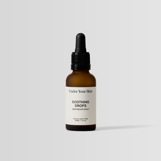 Under Your Skin Soothing Scalp Drops in 30ml brown bottle with pipette applicator. For scalp relief and reduced irritation for all skin types.