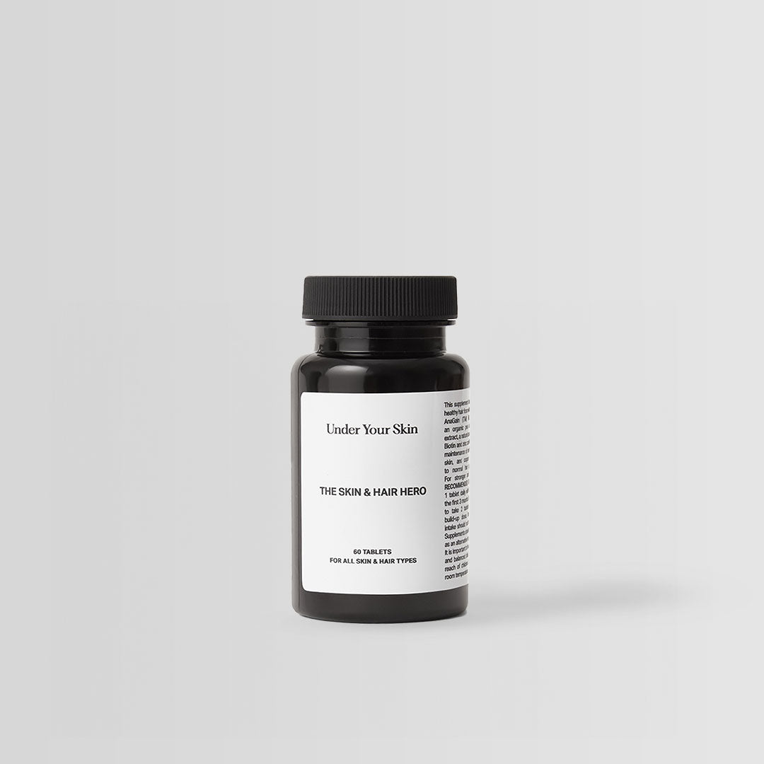 Skin and Hero kosttillskott på vit bakgrund.