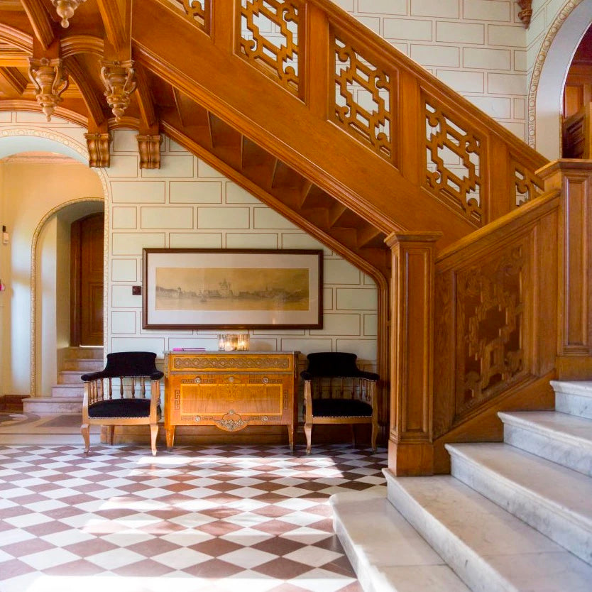 Image of a hotel lobby with staircase.